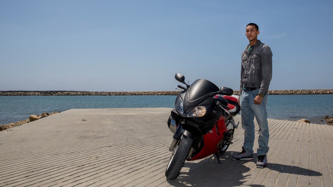 Lance Cpl.  Julio J. Rodriguez, field wireman, 15th Marine Expeditionary Unit, loves the freedom that comes with being a motorcycle rider aboard Camp Pendleton, Calif. Rodriguez, 22, is from Springfield, Mass. (U.S. Marine Corps photo by Cpl. Emmanuel Ramos/Released) 