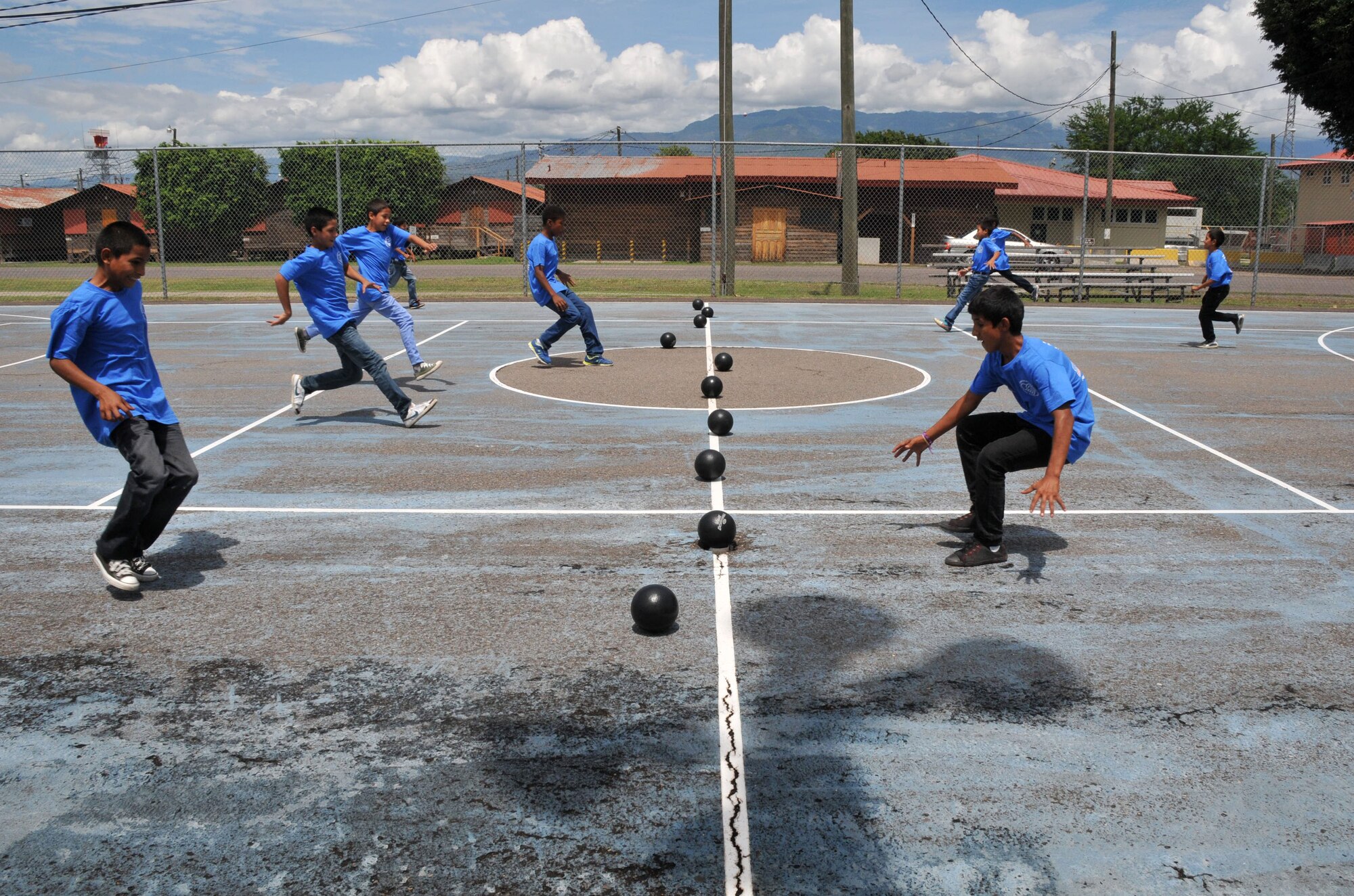 Joint Task Force-Bravo’s Army Forces Battalion (ARFOR) hosted a fun-filled Saturday to 45 boys, and five adult chaperones from Horizontes al Futuro orphanage, May 31. The event was an opportunity for many ARFOR members to interact with the boys for the last time before departing Soto Cano. The kids and adults enjoyed a sandwich and chips lunch, as well as playing soccer, and dodge ball with the servicemembers. (Photo by Ana Fonseca)