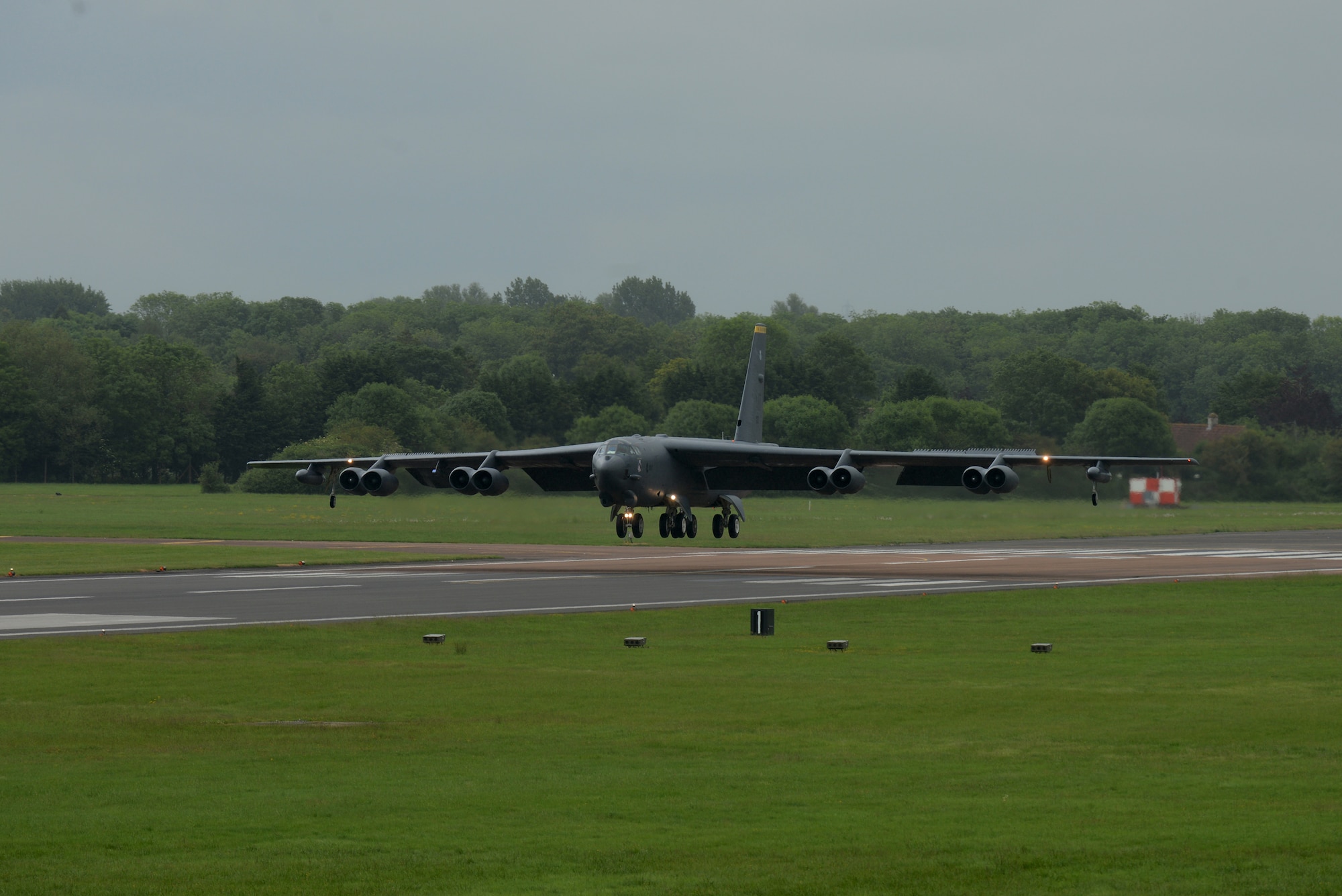 A B-52 Stratofortress is about to touch down at RAF Fairford, United Kingdom, June 4. Two B-52s from the 2nd Bomb Wing at Barksdale Air Force Base, La., and one B-52 from the 5th Bomb Wing at Minot Air Force Base, N.D., have deployed to RAF Fairford for training. (U.S. Air Force photo by Tech. Sgt. Chrissy Best)