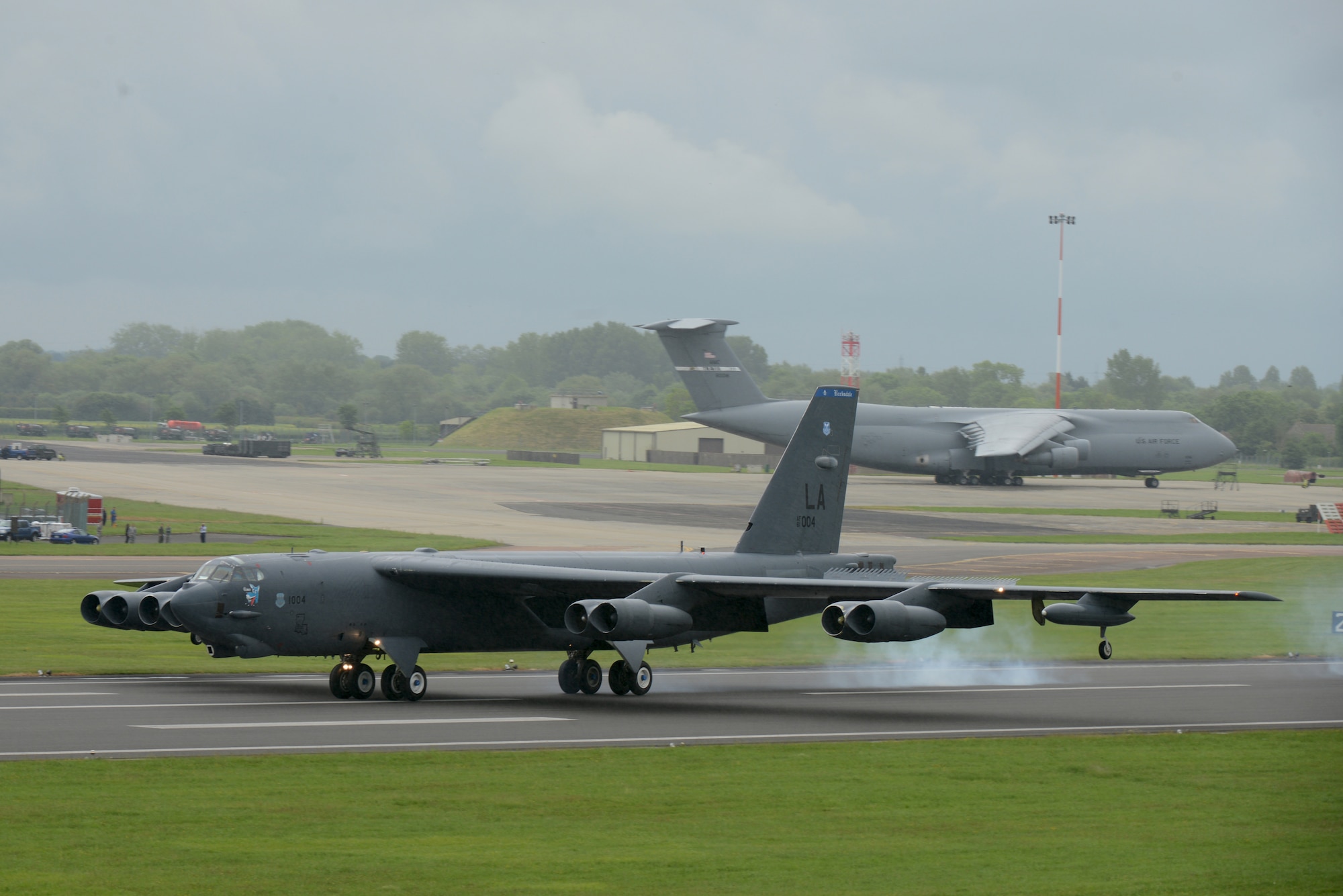A 2nd Bomb Wing B-52 Stratofortress lands at RAF Fairford, United Kingdom, June 4. Three Air Force Global Strike Command B-52s have deployed to RAF Fairford to conduct training. A B-52 is also scheduled to participate in the 70th anniversary D-Day commemorations in Graignes, France, June 7. (U.S. Air Force photo by Tech. Sgt. Chrissy Best)