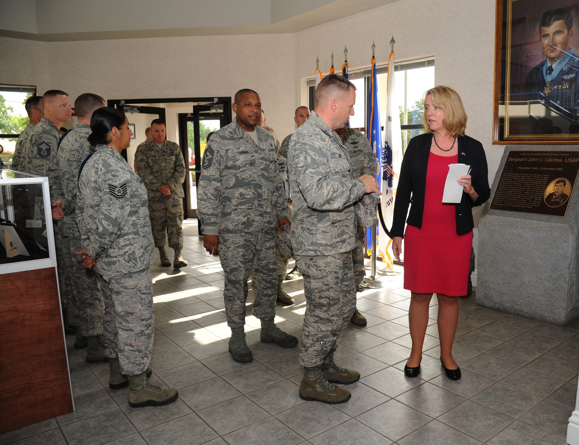 Brig. Gen. Patrick Higby, 81st Training Wing commander, briefs Secretary of the Air Force Deborah Lee James on the operations offered at the Levitow Training Support Facility, during a base orientation visit May 30, 2014, at Keesler Air Force Base, Miss.  James also toured the 403rd Wing and held an All Call for Keesler personnel. (U.S. Air Force photo by Kemberly Groue)