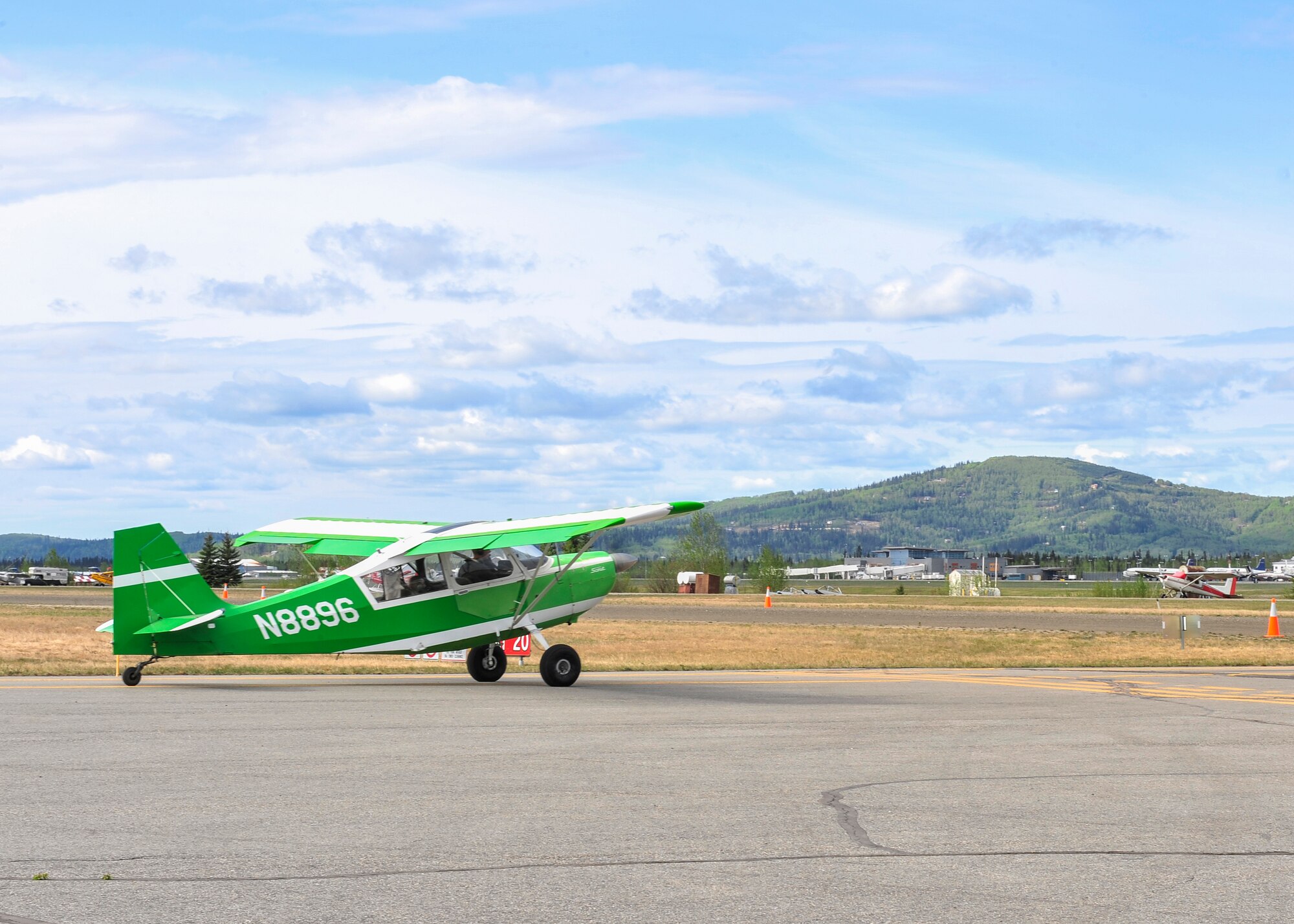 Senior Airman Alex Mumley-Dupuis, 354th Operations Support Squadron airfield management shift lead, taxis his 1973 Citabria during Fairbanks Aviation Day, May 17, 2014, Fairbanks, Alaska. Mumley-Dupuis flew children for the Fairbanks Chapter 1129 Young Eagles program which allows free rides for children ages 8-17. He is planning a flight to Oshkosh, Wis., in July to raise awareness and money for the Wounded Warrior Project through his passion for general aviation. (U.S. Air Force photo by Senior Airman Ashley Nicole Taylor/Released)