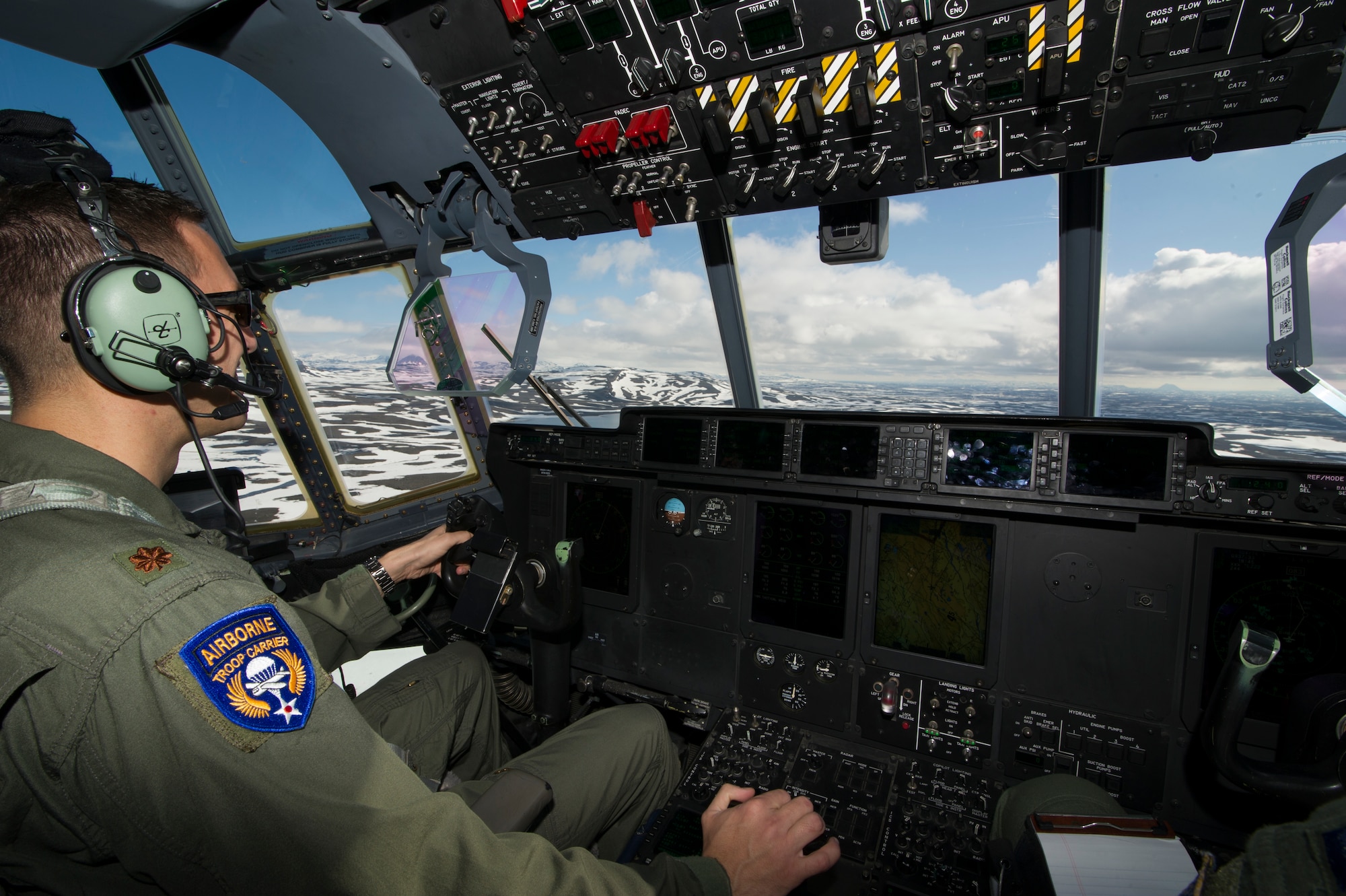 KEFLAVIK, Iceland -- Maj. Geoffrey Ulrich, 48th Air Expeditionary Group C-130J Super Hercules pilot, flies at low altitudes over Iceland May 30, 2014, while deployed for Icelandic Air Policing. The C-130 crew’s primary mission for the deployment is to provide search and rescue airlift for the deployed pararescuemen. (U.S. Air Force photo/Tech. Sgt. Benjamin Wilson)(Released)
