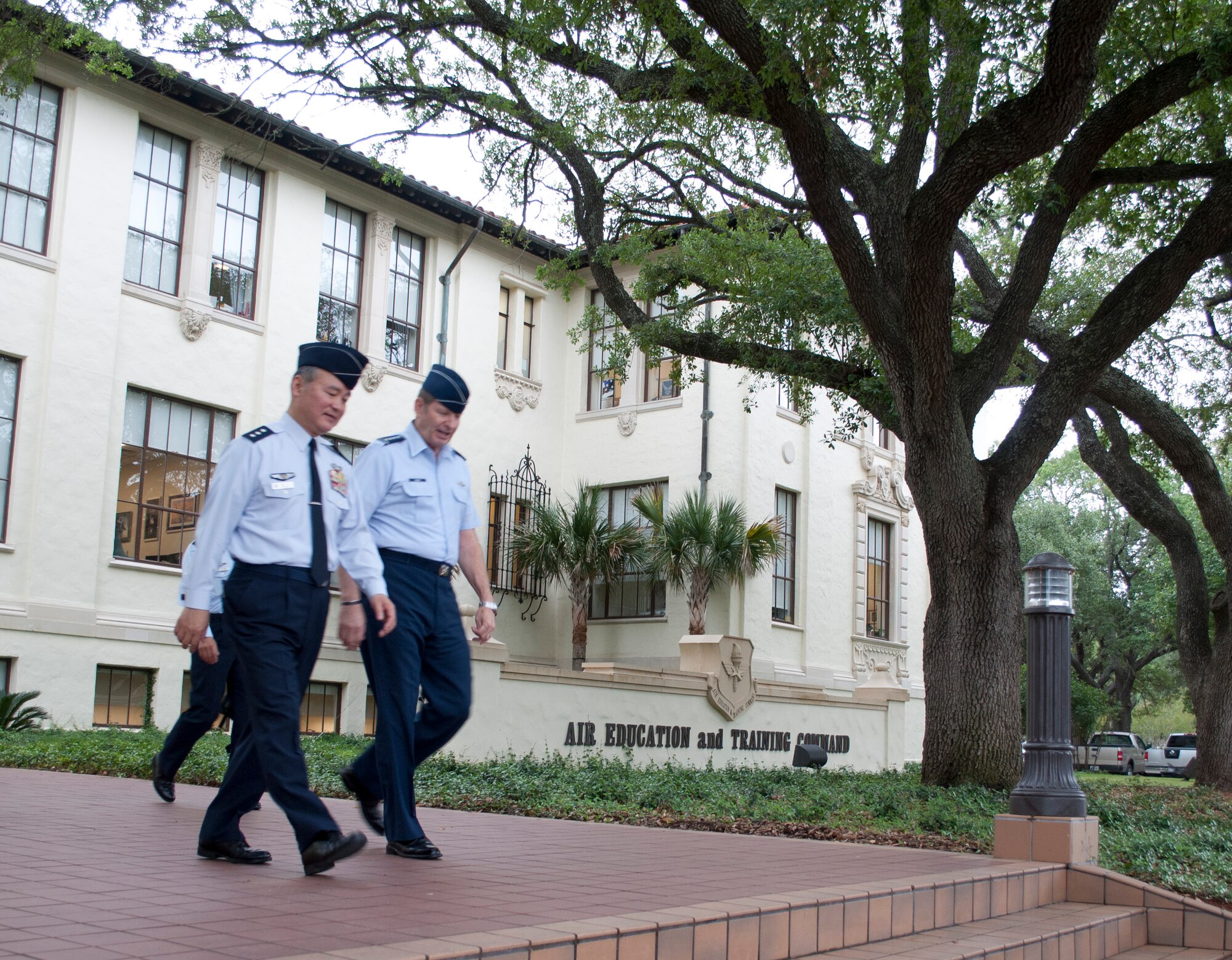 Gen. Robin Rand, commander of Air Education and Training Command, walks with Lt. Gen. Masayuki Hironaka, commander of the Air Training Command for the Japanese Air Self-Defense Force, Japan.  Hironaka visited units throughout Air Training and Education Command May 12, 2014. (U.S. Air Force photo by Capt. Ashley Walker)