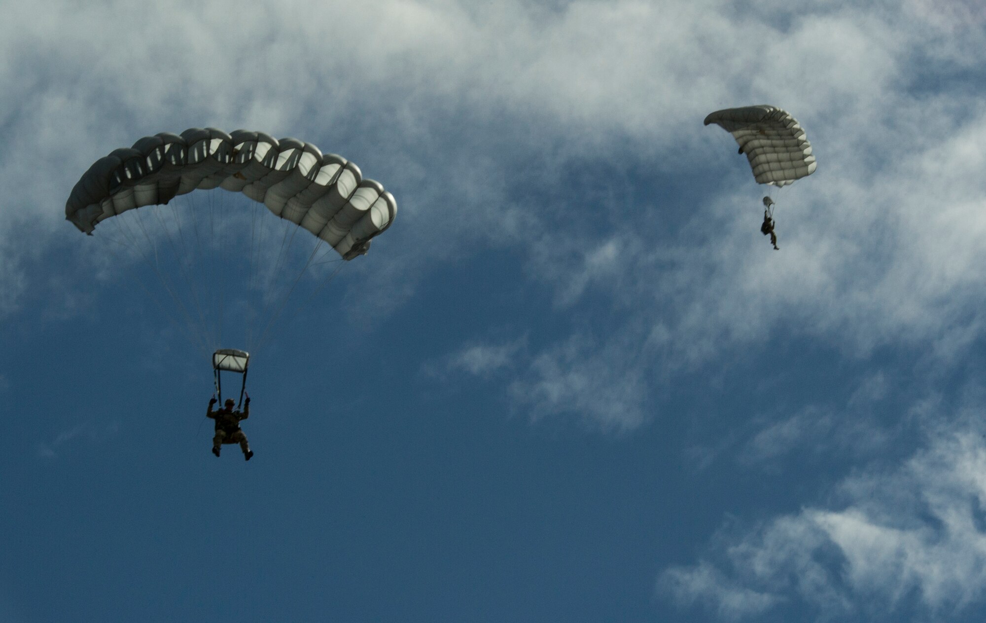 KEFLAVIK, Iceland -- Pararescuemen deployed for Icelandic Air Policing with the 48th Air Expeditionary Group perform jump training near Keflavik International Airport May 22, 2014. The fighter pilots protecting Iceland’s air sovereignty during the deployment are able to travel farther out over the arctic because of the quick-response rescue capability provided by the pararescuemen and C-130J Super Hercules crew. (U.S. Air Force photo/Tech. Sgt. Benjamin Wilson)(Released)