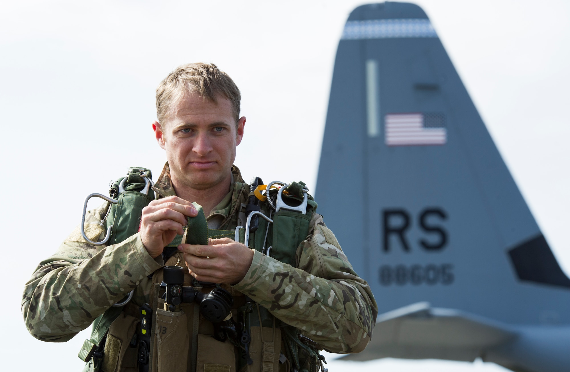 KEFLAVIK, Iceland -- Staff Sgt. Brian, 48th Air Expeditionary Group pararescueman, prepares for a training mission during Icelandic Air Policing at Keflavik International Airport May 22, 2014. The pararescuemen, coupled with the C-130J Super Hercules crew, enable the U.S. Air Force F-15C Eagle pilots in Iceland to travel farther over the icy Atlantic by providing a quick response rescue force. (U.S. Air Force photo/Tech. Sgt. Benjamin Wilson)(Released)