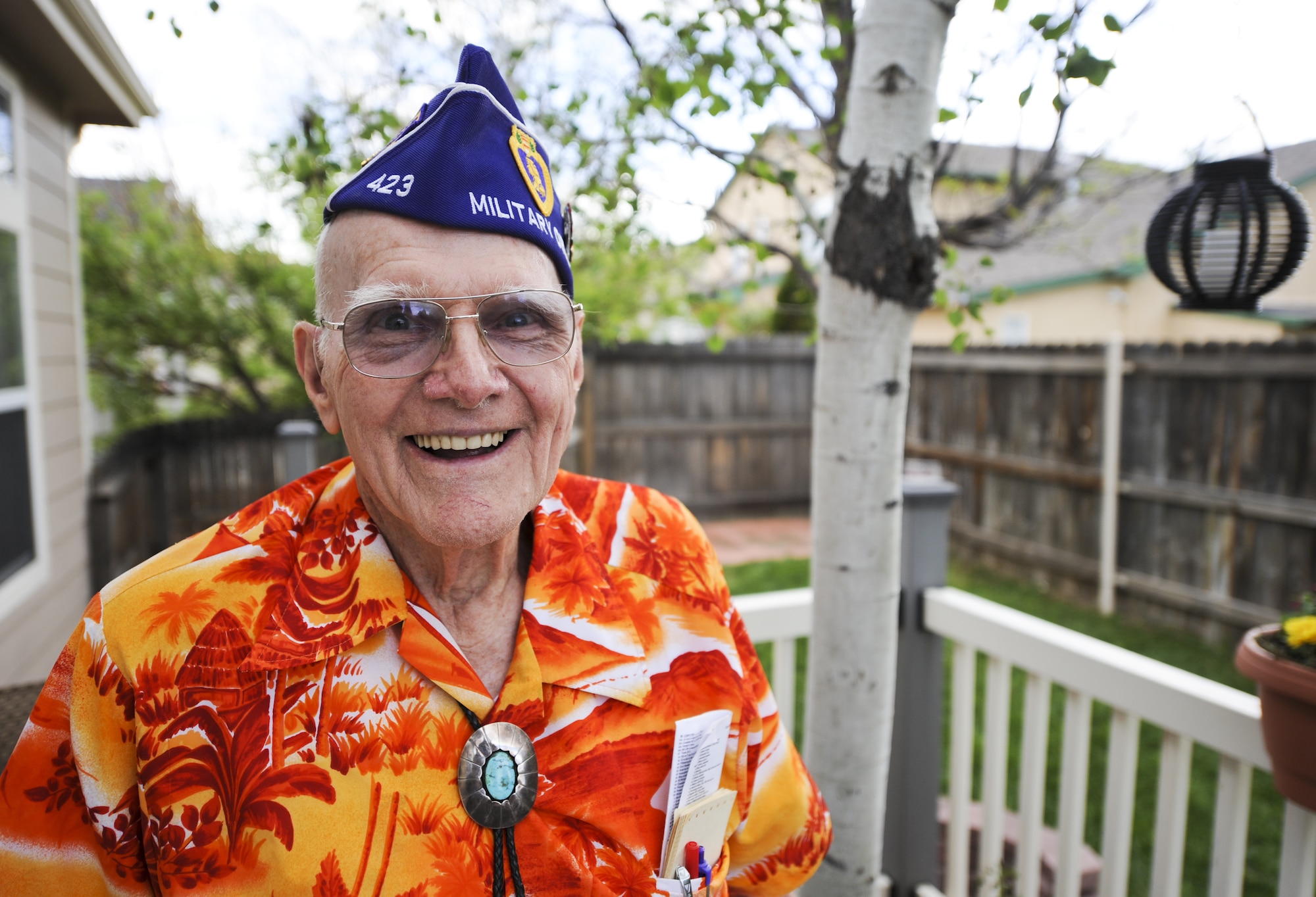 COLORADO SPRINGS, Colo. – Wayne Field stands in his backyard here May 28, 2014, wearing his Military Order of the Purple Heart Association flight cap. Field was a mechanized reconnaissance veteran who fought in the Battle of the Bulge and was wounded shortly after in 1945. After being discharged from the Army, Field started the first post-World War II Civil Air Patrol units in Binghamton, New York, and served in the CAP for more than 30 years contributing to the success of CAP today. Field received the Congressional Gold Medal, the highest civilian award for his service during World War II as a member of the CAP. He joins a prestigious list of recipients ranging from George Washington to Gandhi. (Courtesy photo)