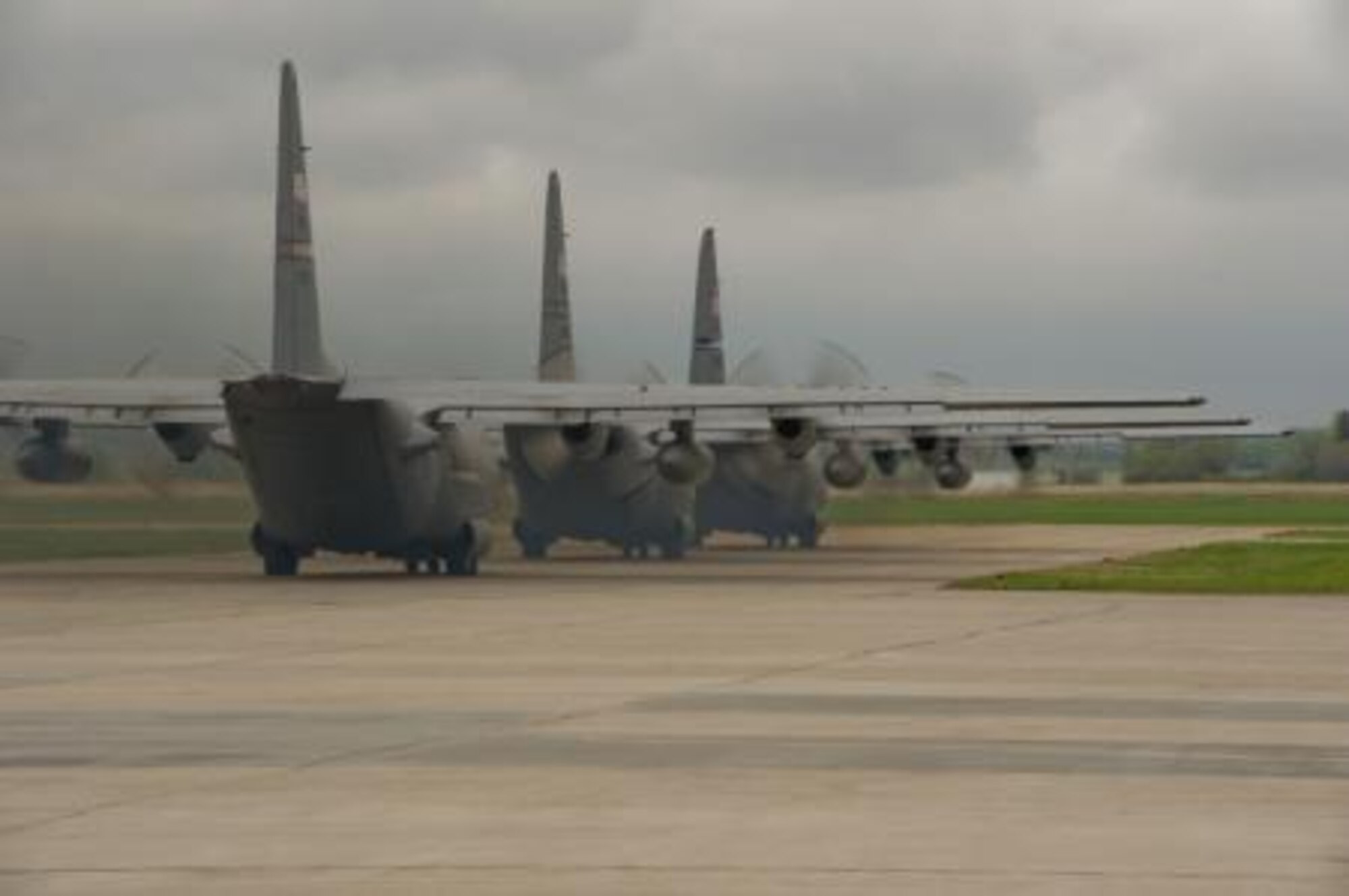 U.S. Air Force C-130 Hercules aircraft prepare for takeoff during Maple Flag in Edmonton/Cold Lake, Alberta, Canada, May 26, 2014. Maple Flag is an international exercise designed to enhance the interoperability of C-130 aircrews, maintainers and support specialists in a simulated combat environment. (U.S. Air Force photo by Tech. Sgt. Matthew Smith/Released)



