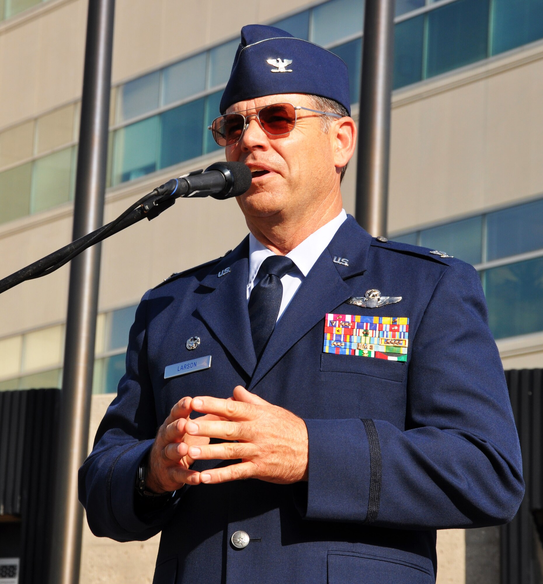 Col. Mark S. Larson, commander of the Air Force Reserve 931st Air Refueling Group, McConnell Air Force Base, Kan., addresses the audience during the Wichita Riverfest Military Salute Ceremony in Wichita, Kan., June 3, 2014.  The annual ceremony pays tribute to past and present members of the U.S. military.  (U.S. Air Force photo by Capt. Zach Anderson)