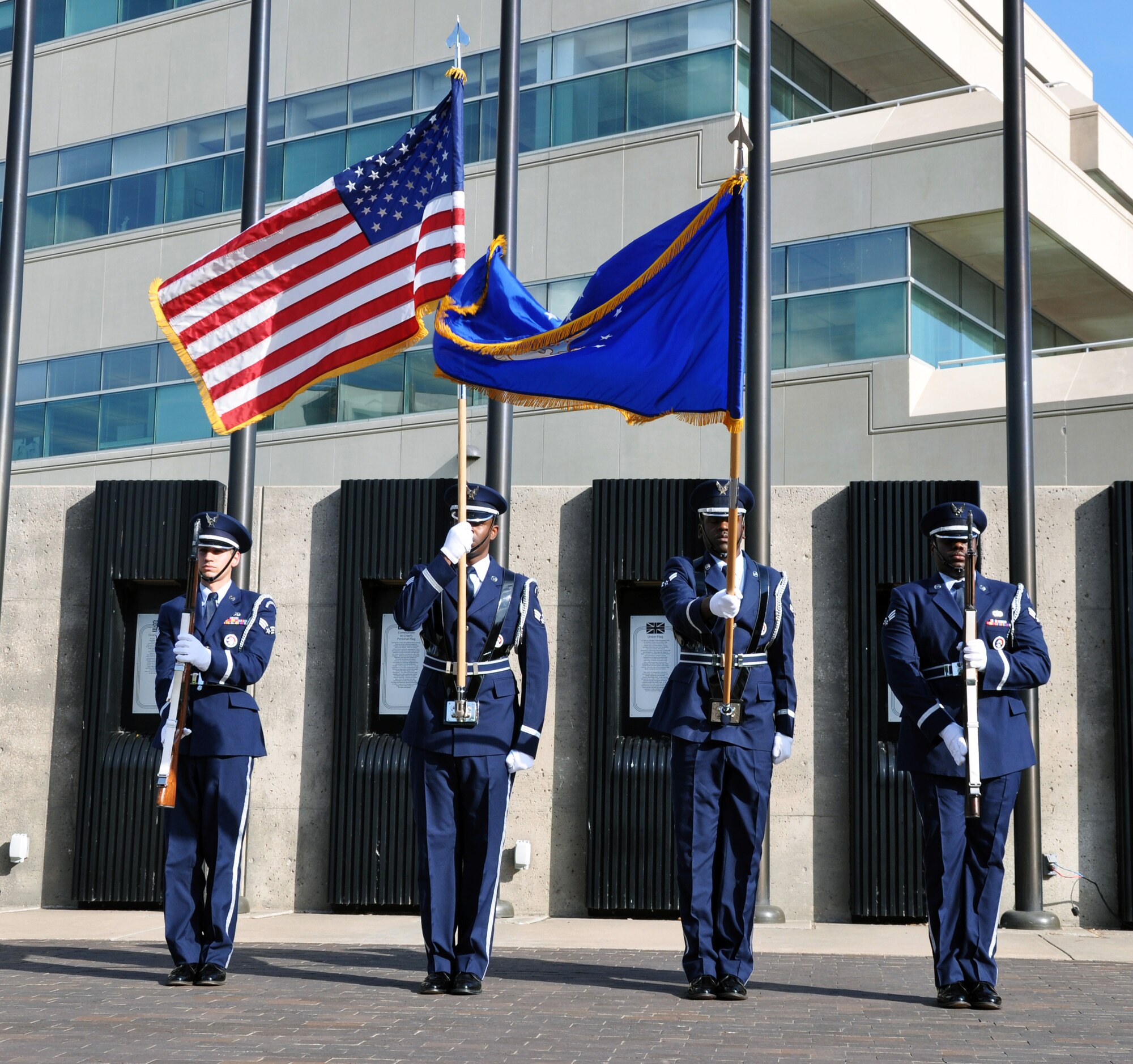 The McConnell Air Force Base Honor Guard posts the colors prior to the playing of the National Anthem at the Wichita Riverfest Military Salute Ceremony in Wichita, Kan., June 3, 2014.  The annual ceremony pays tribute to past and present members of the U.S. military.  (U.S. Air Force photo by Capt. Zach Anderson)