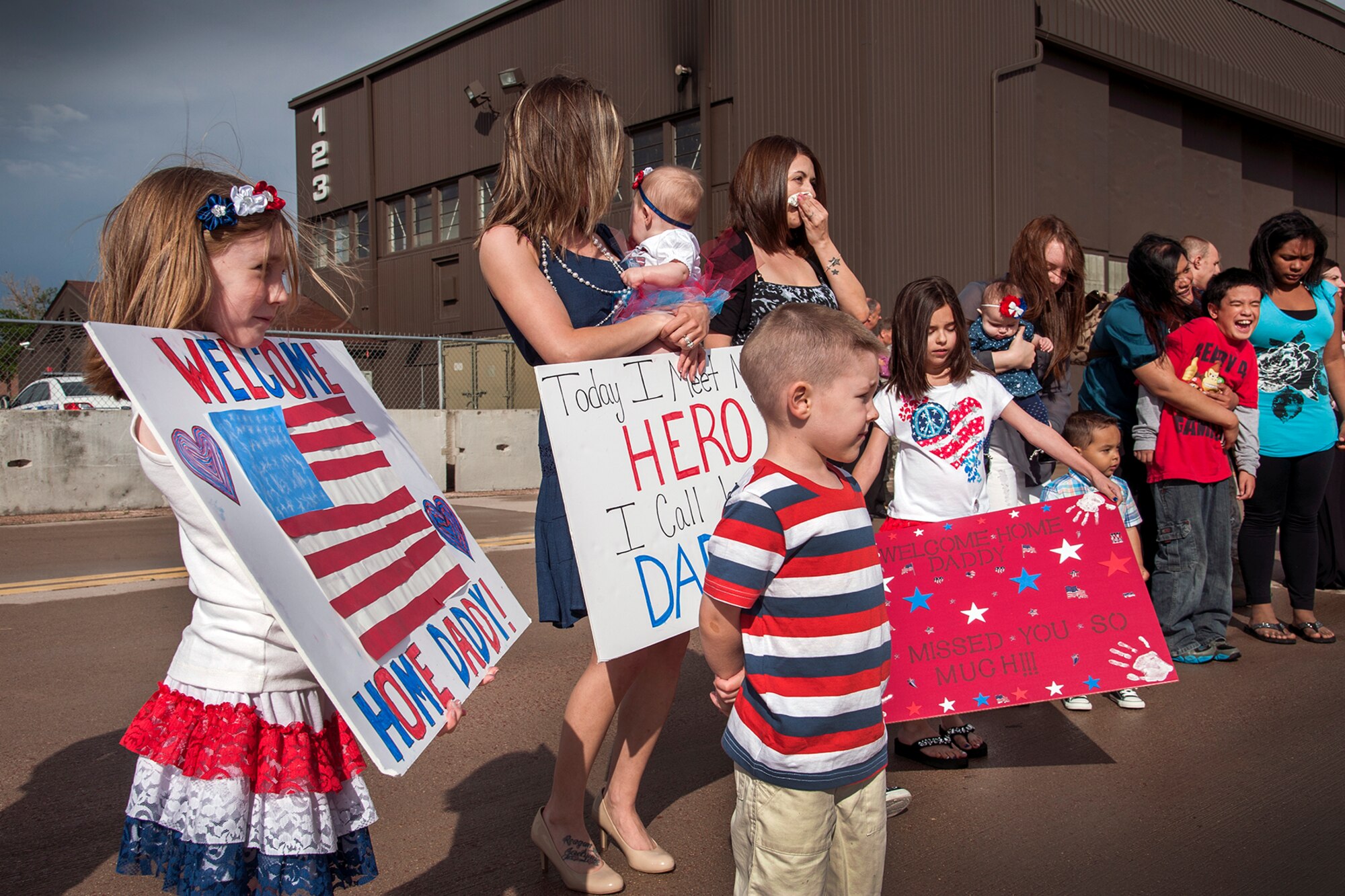 PETERSON AIR FORCE BASE, Colo. – Families eagerly await the return of the 17th Expeditionary Space Control Squadron May 30 at the Peterson flight line. The Airmen were completing deployments to support space control operations with the 17th Expeditionary Space Control Squadron mission to Southwest Asia. (U.S. Air Force photo/Craig Denton)