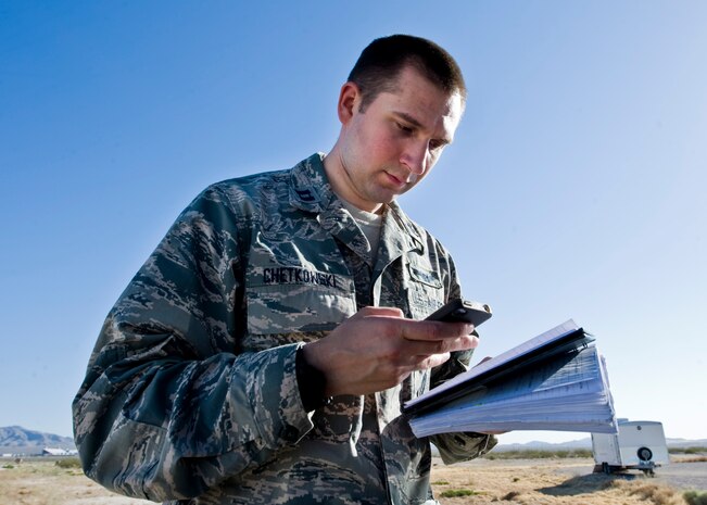 Capt. Michael Chetkowski, 315th Weapons Squadron weapons school student participates in the U.S. Air Force Weapons School integration exercise May 30, 2014, at Nellis Air Force Base, Nev. The USAFWS teaches graduate-level instructor courses that provide the world's most advanced training in weapons and tactics employment. During the course, students receive an average of 400 hours of graduate-level academics and participate in demanding combat training missions. (U.S. Air Force photo by Senior Airman Jason Couillard)