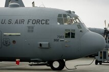 U.S. Air Force C-130 Hercules pilots with the 302nd Airlift Wing, Peterson Air Force Base, Colo., run pre-flight checklists during Maple Flag in Edmonton/Cold Lake, Alberta, Canada, May 26, 2014. Maple Flag is an international exercise designed to enhance the interoperability of C-130 aircrews, maintainers and support specialists in a simulated combat environment. (U.S. Air Force photo by Master Sgt. John R. Nimmo, Sr./Released) 4th Combat Camera Squadron 914th Airlift Wing— at Edmonton International Airport.