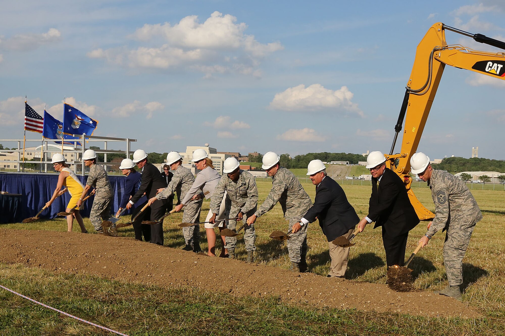 DAYTON, Ohio -- A ceremonial groundbreaking event for the new 224,000 square foot fourth building was held on June 3, 2014, at the National Museum of the U.S. Air Force. (left to right) Amanda Wright Lane, great-grandniece of Orville and Wilbur Wright; Col. Cassie B. Barlow, Commander of 88th Air Base Wing; Fran Duntz, Chairman of the Air Force Museum Foundation Board of Managers; Lt. Gen. (Ret.) Jack Hudson, Director of the National Museum of the U.S. Air Force; Gen. Janet Wolfenbarger, Commander of Air Force Materiel Command; Deborah Lee James, Secretary of the Air Force; Gen. Larry Spencer, Vice Chief of Staff of the Air Force; Lt. Gen. Stephen L. Hoog, Assistant Vice Chief of Staff of the U.S. Air Force; David Dale, Director of Program, U.S. Army Corps of Engineers; Kyle E. Rooney, Vice President and General Manager of Turner Construction Co. (Columbus); and Chief Master Sgt. Michael J. Warner, Command Chief for Air Force Materiel Command. (U.S. Air Force photo by Don Popp) 
