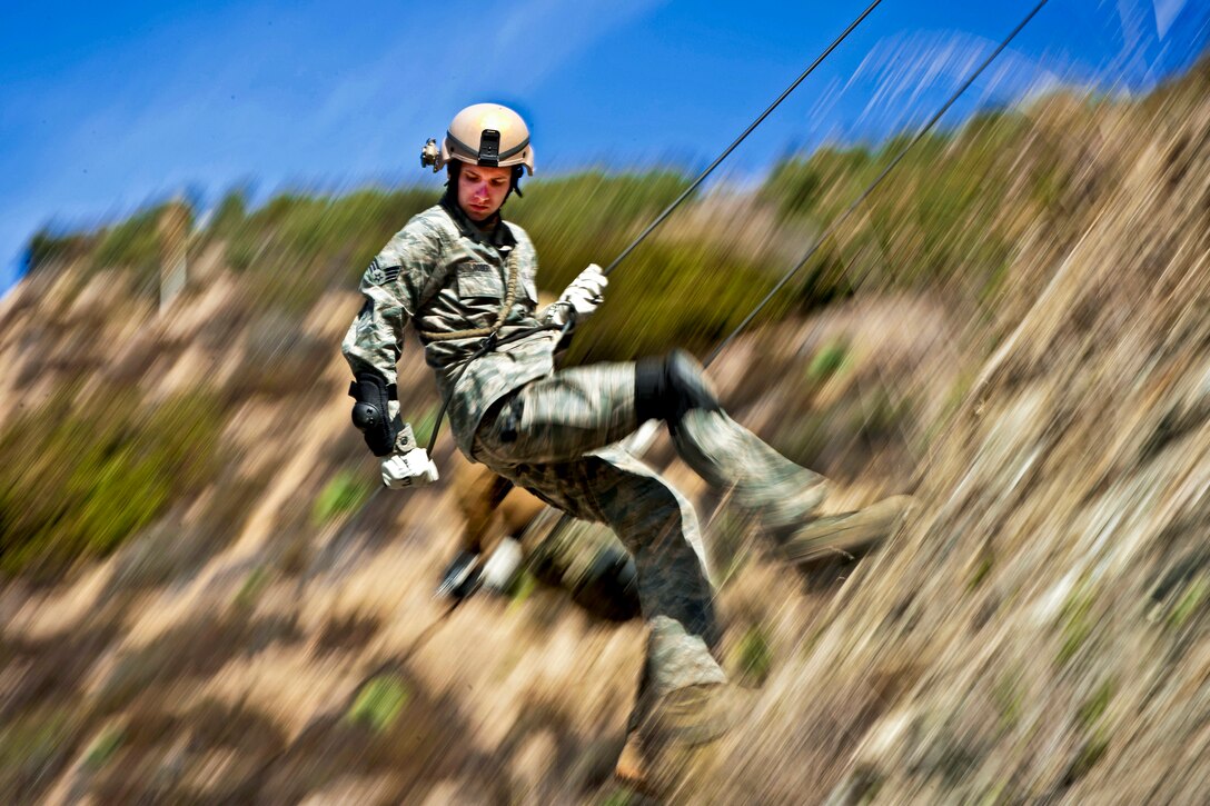 U.S. Air Force Senior Airman Joshua Roberts practices rappelling during Winter Quick Shot 2012 in Azusa, Calif., Feb. 16, 2012. Roberts is assigned to the 4th Combat Camera Squadron. Quick Shot is a field exercise to train combat camera personnel to operate in a combat environment.  
