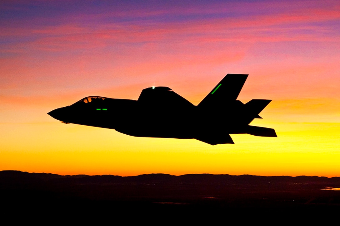 Mark Ward, a Lockheed Martin test pilot, performs the first night flight for the F-35 Joint Strike Fighter over Edwards Air Force Base, Calif., Jan. 18, 2012.  
