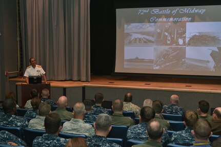 OFFUTT AIR FORCE BASE, Neb. (June 4, 2014) Commander, U.S. Strategic Command (USSTRATCOM) Adm. Cecil D. Haney speaks at USSTRATCOM's Battle of Midway Commemoration ceremony. The ceremony, which observed the battle's 72nd anniversary, featured Haney and the USSTRATCOM Petty Officer Association detailing the decisive battle in the Pacific during World War II. USSTRATCOM is one of nine DoD unified combatant commands and is charged with space operations, information operations, missile defense, global command and control, intelligence, surveillance and reconnaissance, global strike, strategic deterrence, and combating weapons of mass destruction (U.S. Navy photo by Mass Communication Specialist 1st Class Byron C. Linder/Released)
