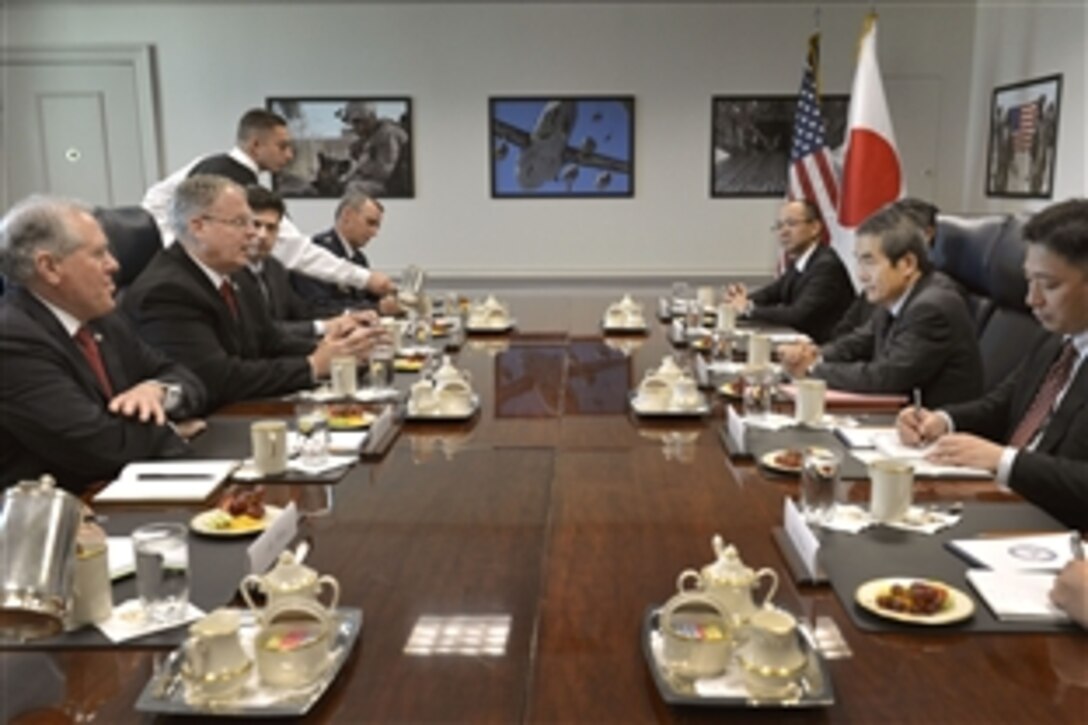 U.S. Deputy Defense Secretary Bob Work meets with Japanese Administrative Vice Minister of Defense Masanori Nishi at the Pentagon, June 3, 2014. The leaders discussed issues of mutual importance. 