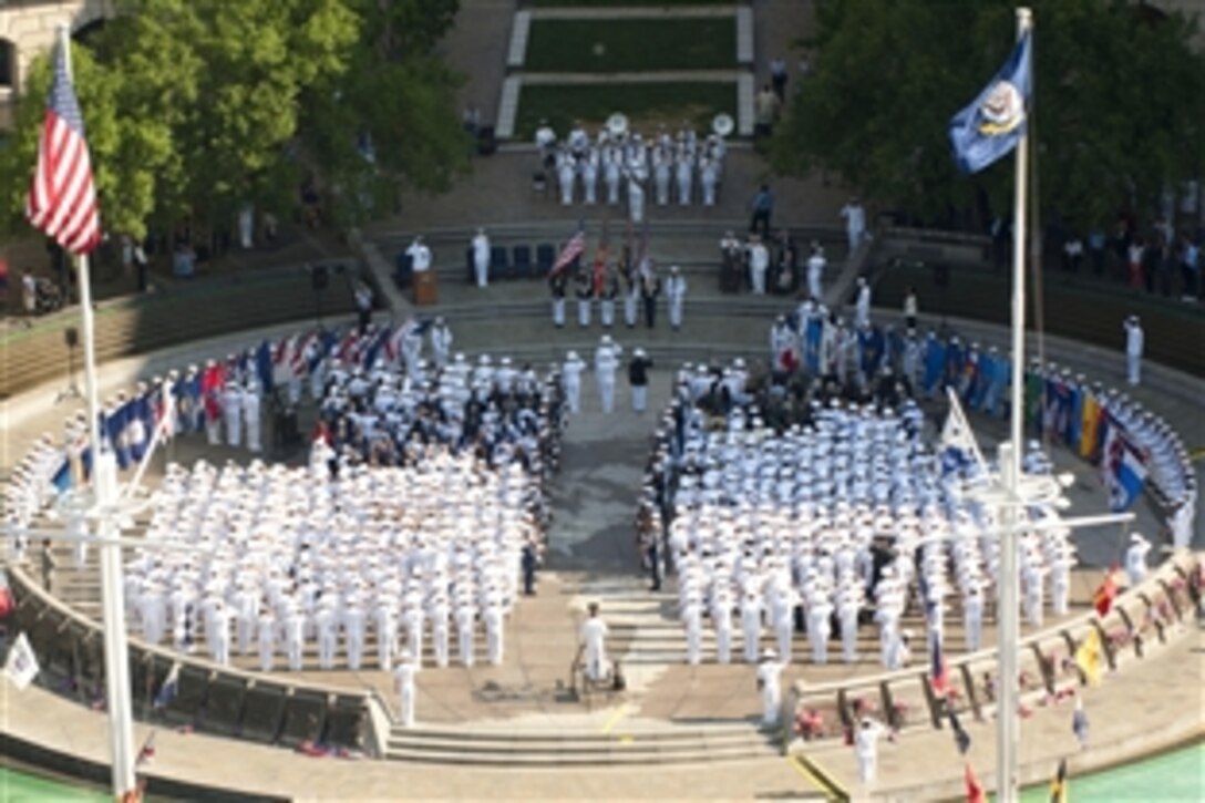 A sea of white uniforms greets visitors to the Navy Memorial as sailors gather to celebrate the 72nd anniversary of the Battle of Midway in Washington, D.C., June 4, 2014. The celebration held host to Marines, Navy, and Coast Guard service members, Midway veterans and a gathered crowd of onlookers. The Battle of Midway is considered by many to be the turning point of the Pacific theater of World War II and one of the most well-known and revered victories in naval history. 
