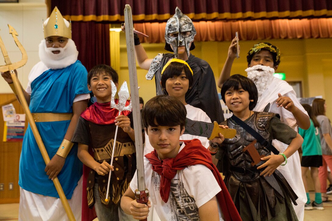 Sixth-graders of Matthew C. Perry Elementary School portray historical figures from Greek and Roman History during the Living Wax Museum at M.C. Perry Elementary School Gym aboard Marine Corps Air Station Iwakuni, Japan, June 3, 2104. This is the sixth consecutive year the sixth-graders put on this event.