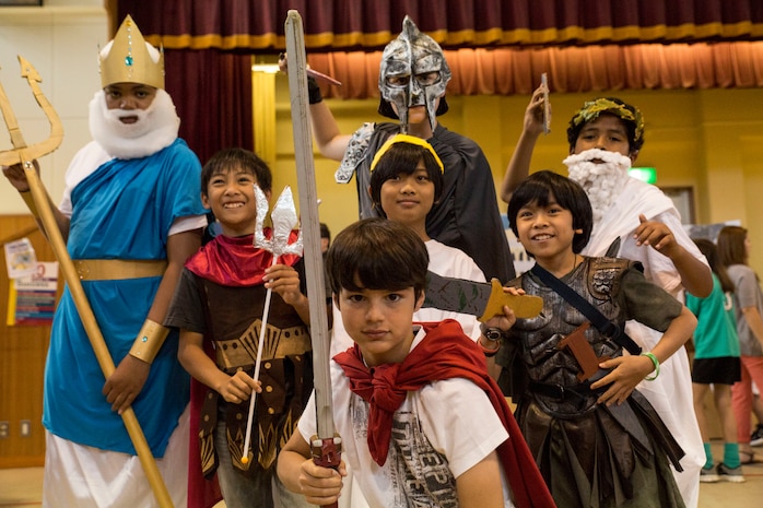 Sixth-graders of Matthew C. Perry Elementary School portray historical figures from Greek and Roman History during the Living Wax Museum at M.C. Perry Elementary School Gym aboard Marine Corps Air Station Iwakuni, Japan, June 3, 2104. This is the sixth consecutive year the sixth-graders put on this event.