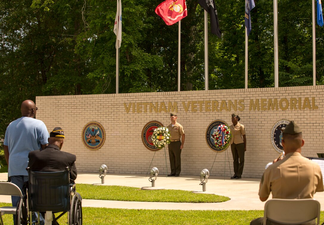 Marines stand alongside wreaths, in memory of Vietnam veterans and the appreciation of a grateful nation, during the Vietnam Veterans Memorial rededication ceremony at Lejeune Memorial Gardens in Jacksonville, N.C., May 31. The ceremony honored those who perished during the war and celebrated the accomplishments and perseverance of Vietnam-era veterans.(U.S. Marine Corps photo by Cpl. Jackeline M. Perez Rivera/Released)