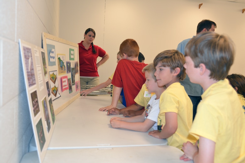 Mary Lewis, a biologist  with the U.S. Army Corps of Engineers Nashville District Planning Branch, talks to kids at the Williamson County Junior Gardener Camp at the Agricultural Exposition Park June 3, 2014 about plants and insects located in wetland areas. 