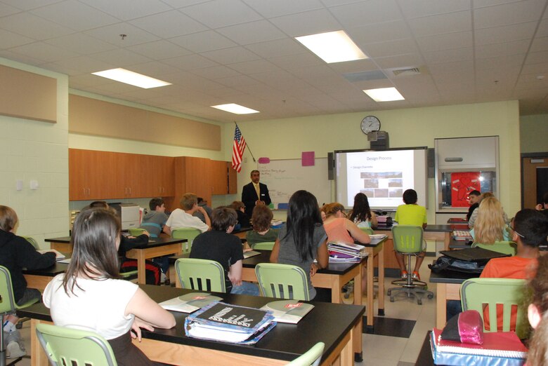 Army Corps Architect Charles Paray showing students the steps he takes to design a project.