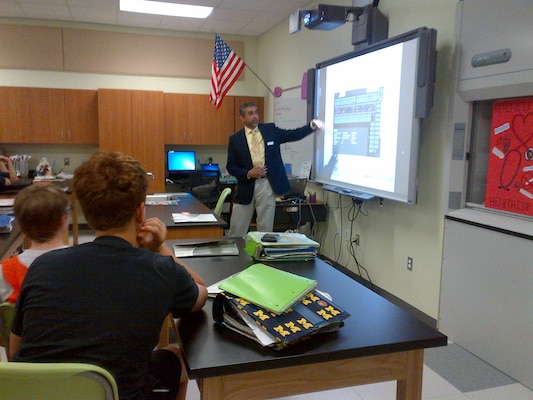 Army Corps Architect Charles Paray showing students the steps he takes to design a project.