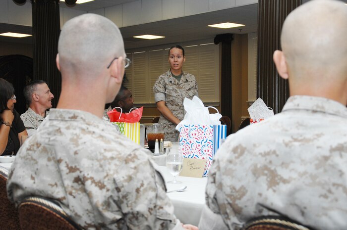 Staff Sgt. Juana Snell, founder of Mentors In Action, expresses her appreciation to Marines for their participation in the M.I.A. program during a luncheon held at the Town and Country Restaurant’s Grand Ballroom here, May 28.
