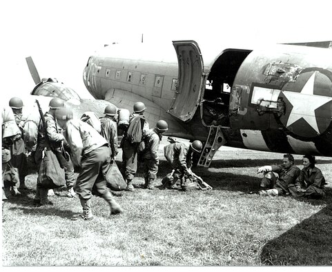 Paratroopers prepare to board a C-47 assigned to the 50th Troop Carrier Squadron June 5, 1944. (Courtesy photo)
