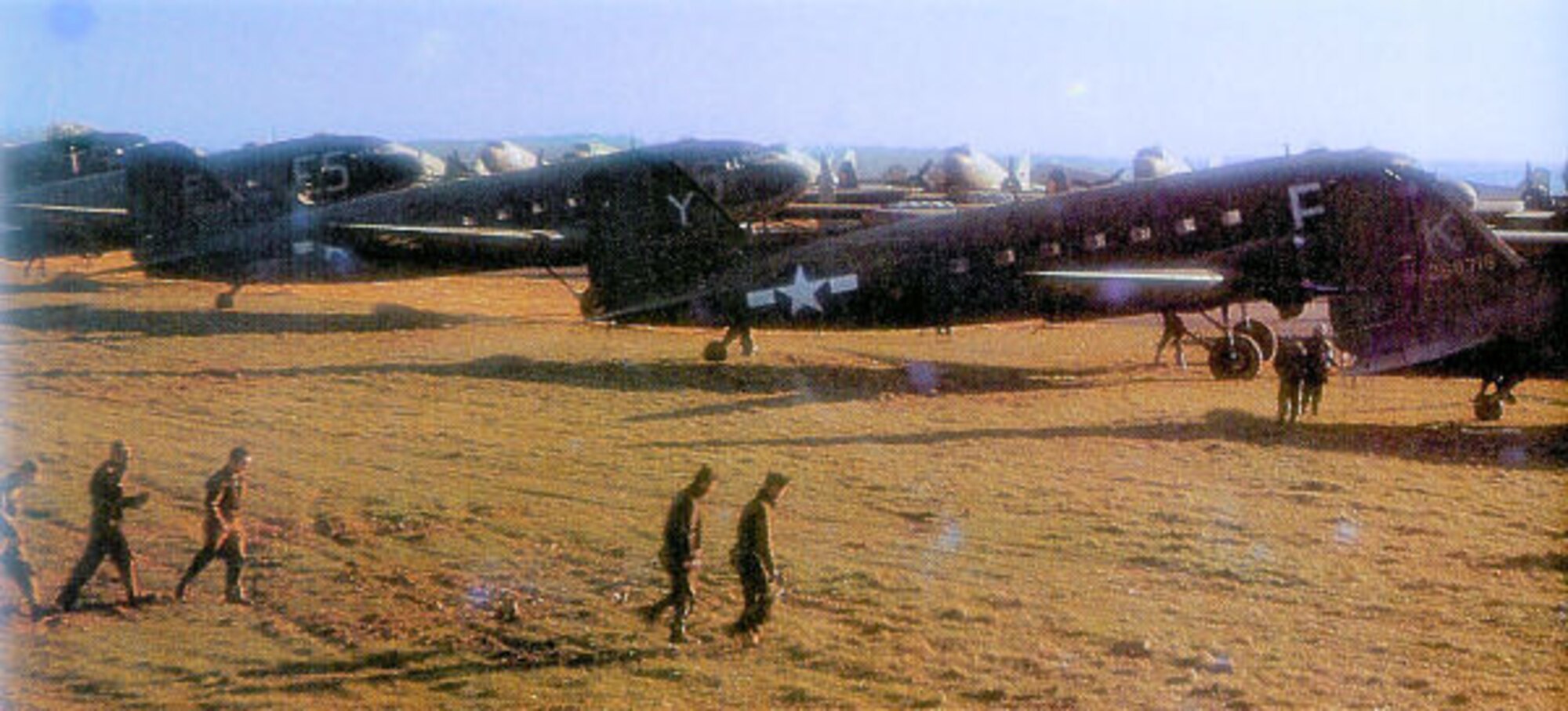 Planes from the 62nd Troop Carrier Squadron prepare for departure at Saltby Air Field, June 5, 1944. (Courtesy photo)