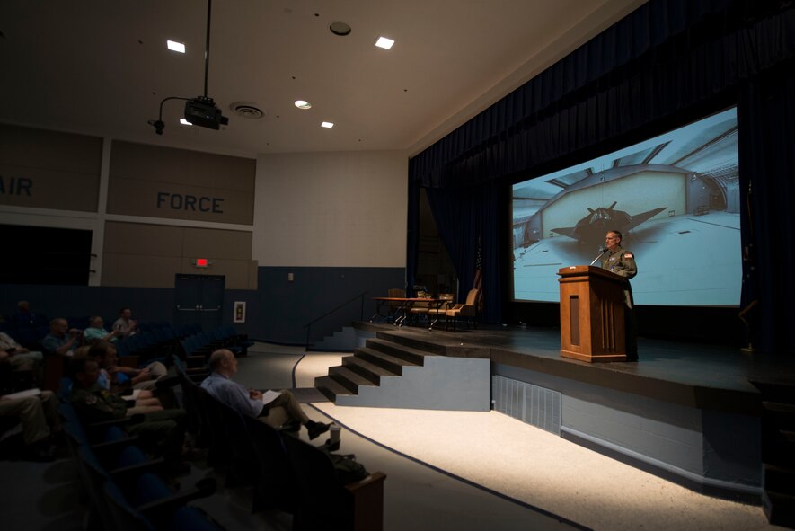 Retired U.S. Air Force Lt. Col. Dale Zelko, former F-117A Nighthawk pilot, talks about the retired F-117A aircraft during the Combat Search and Rescue Society Symposium at Moody Air Force Base, Ga., May 28, 2014. The F-117A was retired in April 2008 and was later replaced by the F-22 Raptor. (U.S. Air Force photo by Airman Dillian Bamman/Released)