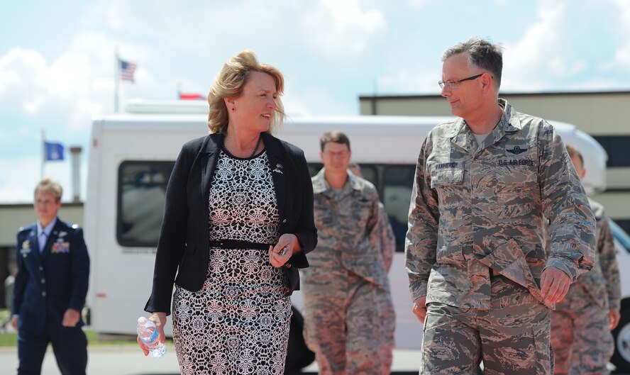 Secretary of the Air Force Deborah Lee James walks with Brig. Gen. Glen D. VanHerck during her visit to Whiteman Air Force Base, Mo., May 29, 2014. James’ top three priorities are taking care of people, balancing today’s readiness with tomorrow’s, and making every dollar count. (U.S. Air Force photo by Staff Sgt. Nicholas Wilson/Released)