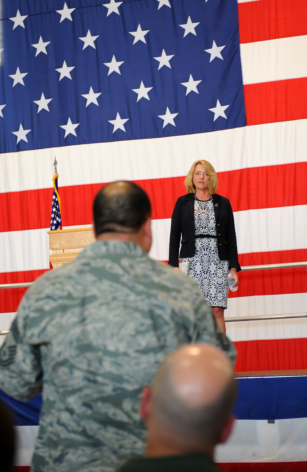 Secretary of the Air Force Deborah Lee James answers a question from Chief Master Sgt. Rufino Gonzalez 509th Operations Group during an all-call at Whiteman Air Force Base, Mo., May 29, 2014.  The SecAF is responsible for the affairs of the Department of the Air Force, including the organizing, training, equipping and providing for the welfare of its active duty, Guard, Reserve and civilian Airmen and their families. (U.S. Air Force photo by Airman 1st Class Joel Pfiester/Released)