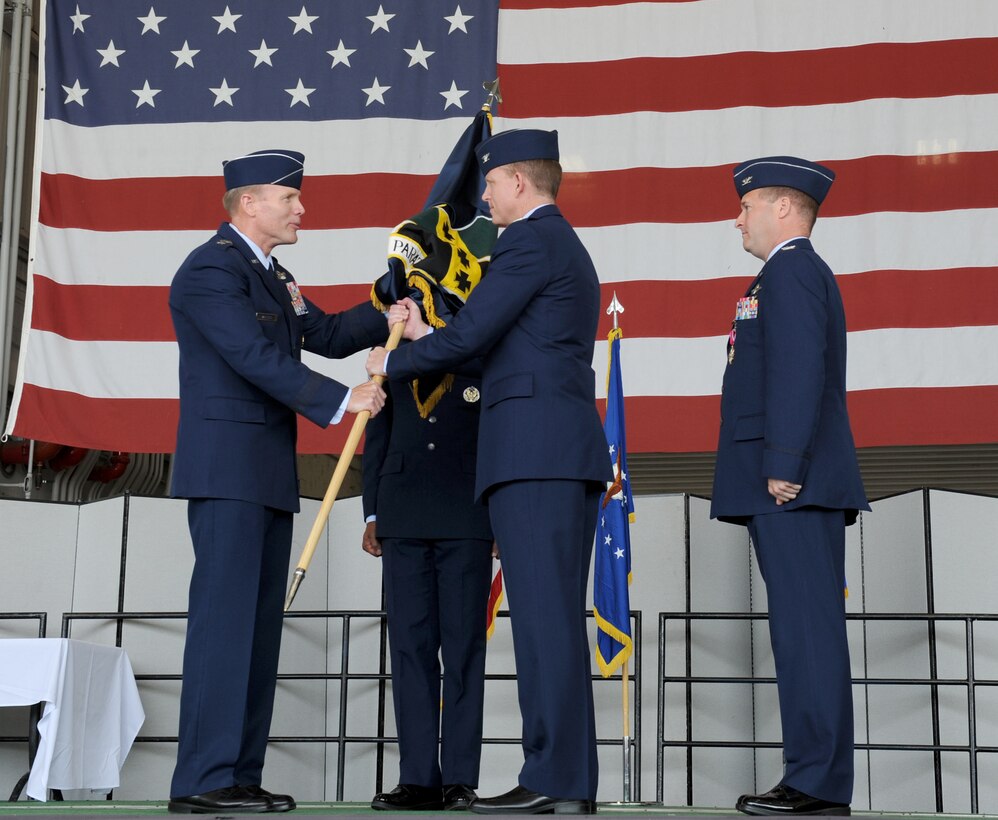 Col. Douglas Lee (center) takes command of the 9th Reconnaissance Wing during a change of command ceremony at Beale Air Force Base, Calif., May 30. Lt. Gen. Tod Wolters, 12th Air Force commander, was the presiding official for the ceremony. (U.S. Air Force photo by Staff Sgt. Robert M. Trujillo/Released)   
