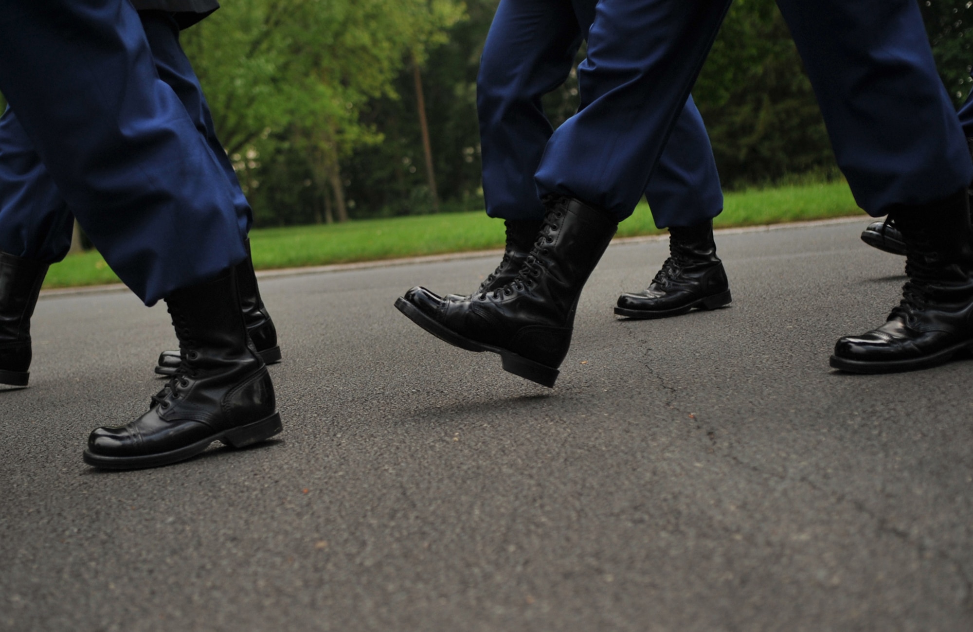 Members from the 5th Quartermaster Theater Aerial Delivery Company, 435th Air Ground Operations Wing’s Contingency Response Group and 21st Theater Sustainment Command march toward the grave of Pvt. Richard Vargas during a wreath laying ceremony at Lorraine American National Cemetery and Memorial, St. Avold, France, June 2, 2014. Vargas saved the life of Leslie Cruise, a World War II veteran. Cruise went to France several times prior to this visit looking for his friend’s grave in order to say thank you. (U.S. Air Force photo/Senior Airman Hailey Haux)