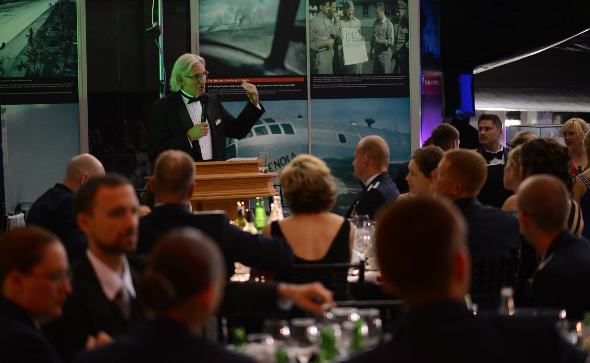 Retired U.S. Air Force Maj. Gen. David Scott, 7th Special Operations Squadron commander from July 1994 to July 1995, speaks to attendees of the 7th SOS 50th anniversary celebration May 31, 2014, at the Imperial War Museum Duxford in Cambridge, England. Scott, the keynote speaker for the event, spoke about his time with the squadron and showed a video which played originally at the 30th anniversary celebration. (U.S. Air Force photo/Airman 1st Class Dillon Johnston/Released)