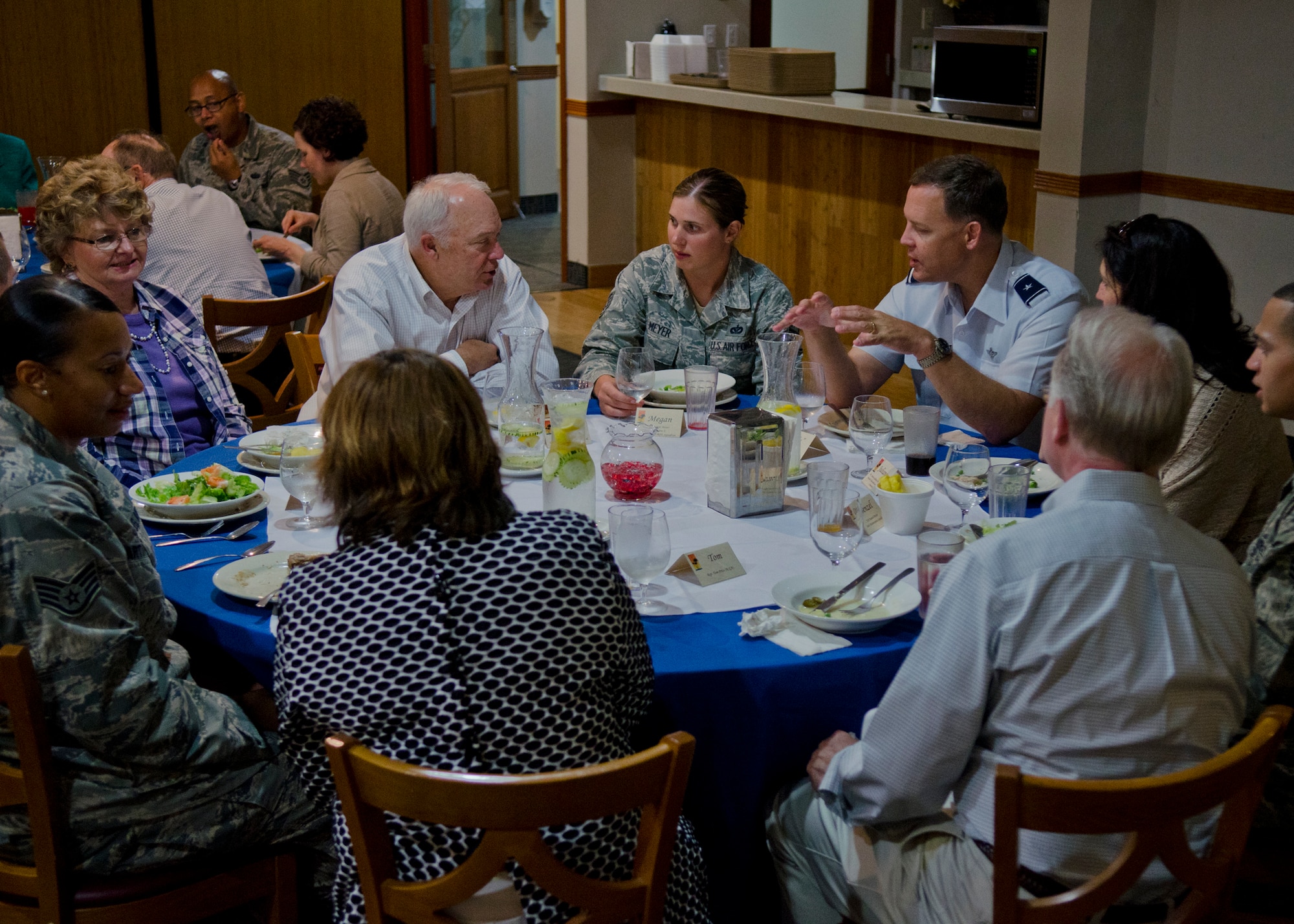 Visiting U.S. Congress members eat lunch with 36th Wing leadership and Airmen June 2, 2014, on Andersen Air Force Base, Guam. The eight visiting representatives and their staffs toured Guam in order to learn about the mission of the 36th Wing and gain an understanding of the Pacific region and its relationship to American national security. (U.S. Air Force photo by Senior Airman Katrina M. Brisbin/Released)