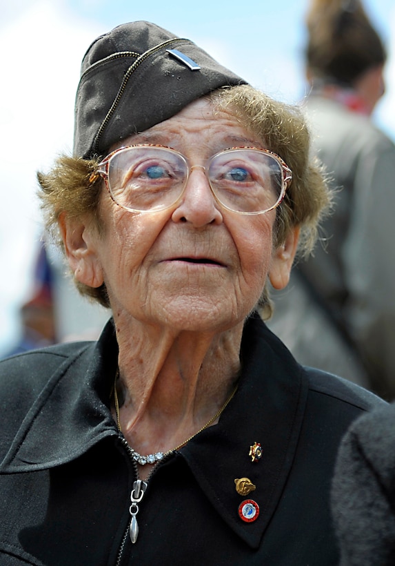 Ellan Levitsky-Orkin, who served as a U.S. Army nurse in Normandy during World War II, listens to a speech by U.S. Army paratrooper during a ceremony honoring the service of U.S. Army nurses during World War II, in Bolleville, France, June 4, 2014.