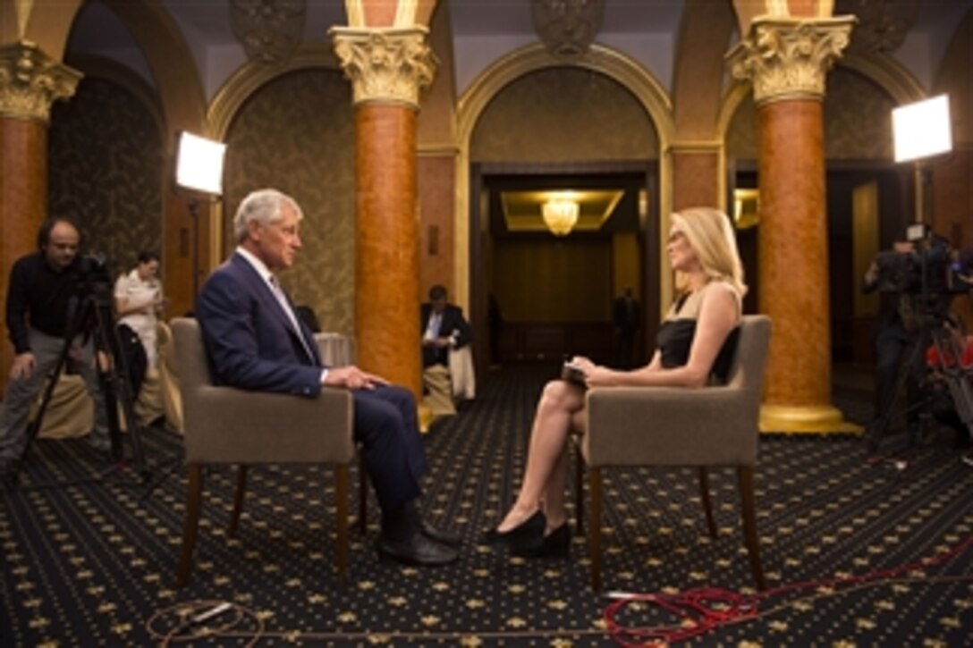 U.S. Defense Secretary Chuck Hagel answers questions during an interview with Katty Kay of "BBC World News America" at the Iaki Hotel in Constanta, Romania, June 5, 2014. The secretary is on a 12-day trip to Asia and Europe.