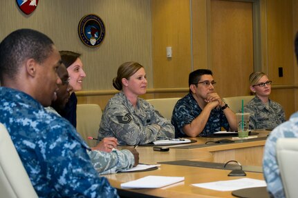 OFFUTT AIR FORCE BASE, Neb. (June 5, 2014) The U.S. Strategic Command (USSTRATCOM) Rising Strategic Leaders (RSL) group listens to guest speaker Joint Functional Component Command-Global Strike Senior Enlisted Leader Command Sgt. Maj. Sheryl Lyon during the first RSL meeting. The RSL group promotes communication, professionalism, responsibility, camaraderie, esprit de corps and mentoring of the mid-to- lower enlisted corps across all services within USSTRATCOM through professional development, information flow, community service, and morale-building activities. (U.S. Navy photo by Mass Communication Specialist 1st Class Byron C. Linder/Released)