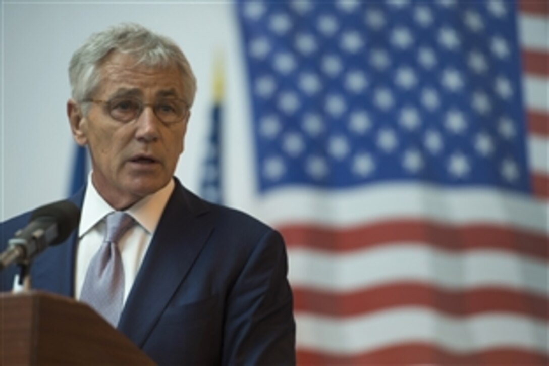 U.S. Defense Secretary Chuck Hagel and Romanian Defense Minister Mircea Dusa, not shown, conduct a press briefing at the Constanta Passenger Terminal in Constanta, Romania, June 5, 2014.  