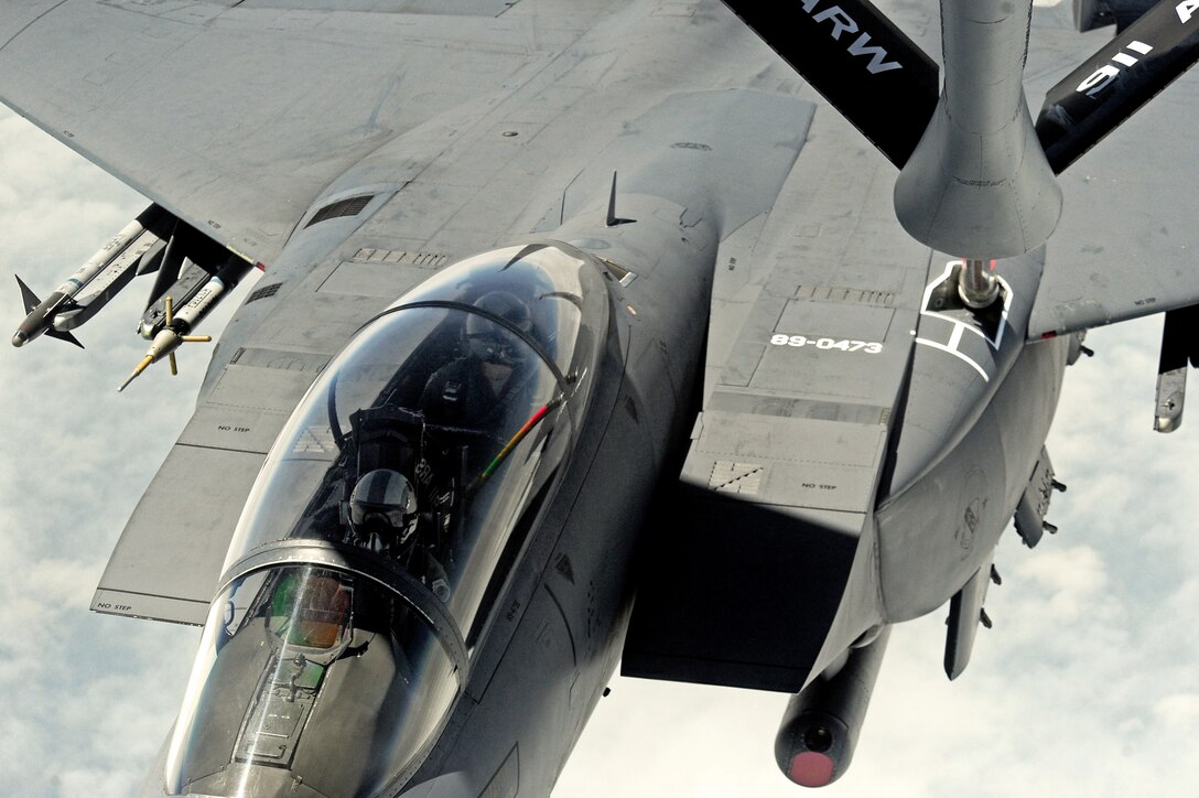 An F-15E Strike Eagle aircraft piloted by Col. Jeannie Leavitt receives fuel from a KC-135R Stratotanker during her final flight, May 29, 2014, over North Carolina. During her career as the first female fighter pilot, Leavitt recorded more than 2,600 flying hours in the F-15E. Leavitt is the 4th Fighter Wing commander. (U.S. Air Force photo/Senior Airman John Nieves Camacho)