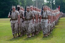 Marines with Combat Logistics Regiment 25, 2nd Marine Logistics Group march into position change of command ceremony at Camp Lejeune, N.C., June 4, 2014. Col. Terrence A. O’Connell, the outgoing commanding officer of CLR-25, relinquished command to Col. Kevin J. Stewart. (U.S. Marine Corps still image by Cpl. Jessica S. Gonzalez)