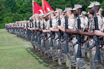Marines with Combat Logistics Regiment 25, 2nd Marine Logistics Group stand in formation during a change of command ceremony at Camp Lejeune, N.C., June 4, 2014. Col. Kevin J. Stewart, the regiment’s new commanding officer, received the regimental colors from Col. Terrence A. O’Connell, who took command of CLR-25 in 2012. (U.S. Marine Corps still image by Cpl. Jessica S. Gonzalez)