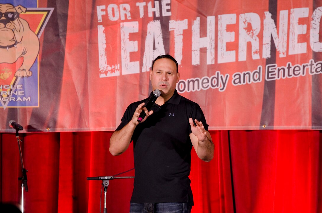 MARINE CORPS BASE HAWAII - Comedian Mark Viera performs for Marines and sailors at the base theater, June 4, 2014. The tour featured Ben Gleib, Ronnie Jordan and Mark Viera, THE FARM, and DJ Big Mike. (U.S. Marine Corps photo by Kristen Wong)