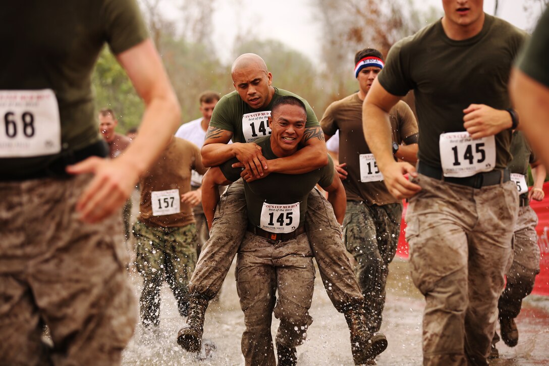Marines and sailors competed in the Commanding General's Cup Mud Run at Lake O'Neill June 6. The run is a 10K with militaristic obstacles including a rope net, wall climb and low crawling through a mud pit. 

The Commanding General's Cup is a series of athletic events for units on base to compete in. 1st Combat Engineer Battalion were the winners of the run.
