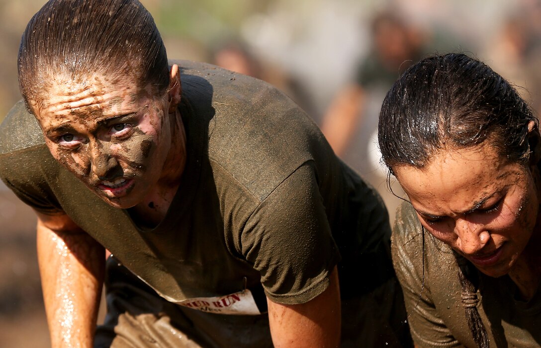 Marines and sailors competed in the Commanding General's Cup Mud Run at Lake O'Neill June 6. The run is a 10K with militaristic obstacles including a rope net, wall climb and low crawling through a mud pit. 

The Commanding General's Cup is a series of athletic events for units on base to compete in. 1st Combat Engineer Battalion were the winners of the run.
