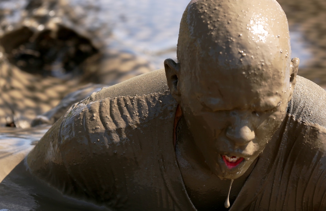 Marines and sailors competed in the Commanding General's Cup Mud Run at Lake O'Neill June 6. The run is a 10K with militaristic obstacles including a rope net, wall climb and low crawling through a mud pit. 

The Commanding General's Cup is a series of athletic events for units on base to compete in. 1st Combat Engineer Battalion were the winners of the run.
